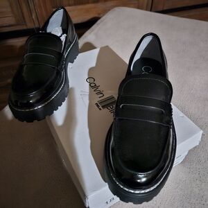 Calvin Klein black , new. Never used with stitching